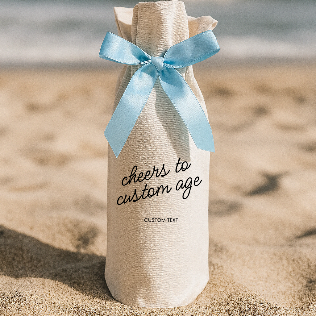 Personalized "Cheers To Your" Wine Gift Bag in Cotton Canvas fabric with a blue satin ribbon