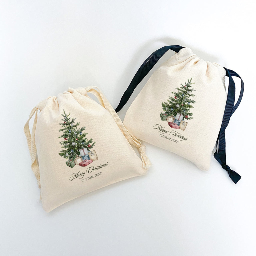 Two drawstring bags with Christmas tree designs and text on cotton canvas fabric