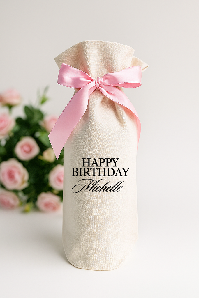 Wine gift bag with pink ribbon and 'Happy Birthday Michelle' text. Personalized custom wine gift bag