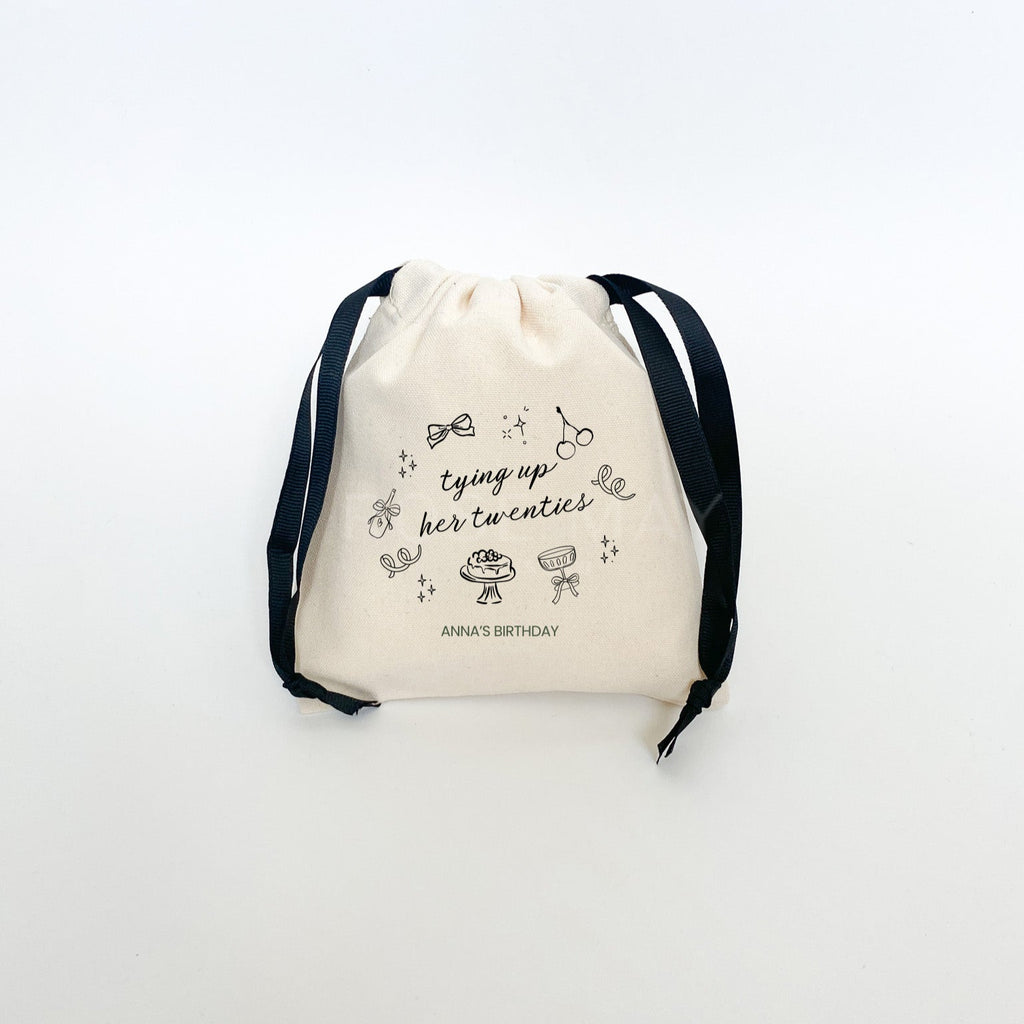 Tying Up Her Twenties birthday party favor bag in cotton canvas fabric and black drawstring ribbon
