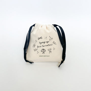 Tying Up Her Twenties birthday party favor bag in cotton canvas fabric and black drawstring ribbon
