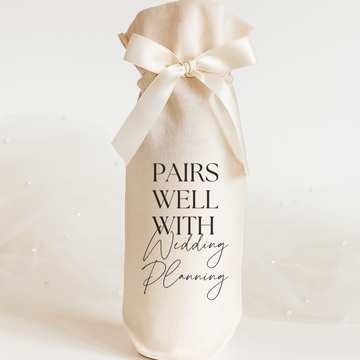Wine gift bag with 'Pairs Well with Wedding Planning' gift for the bride with an Ivory ribbon